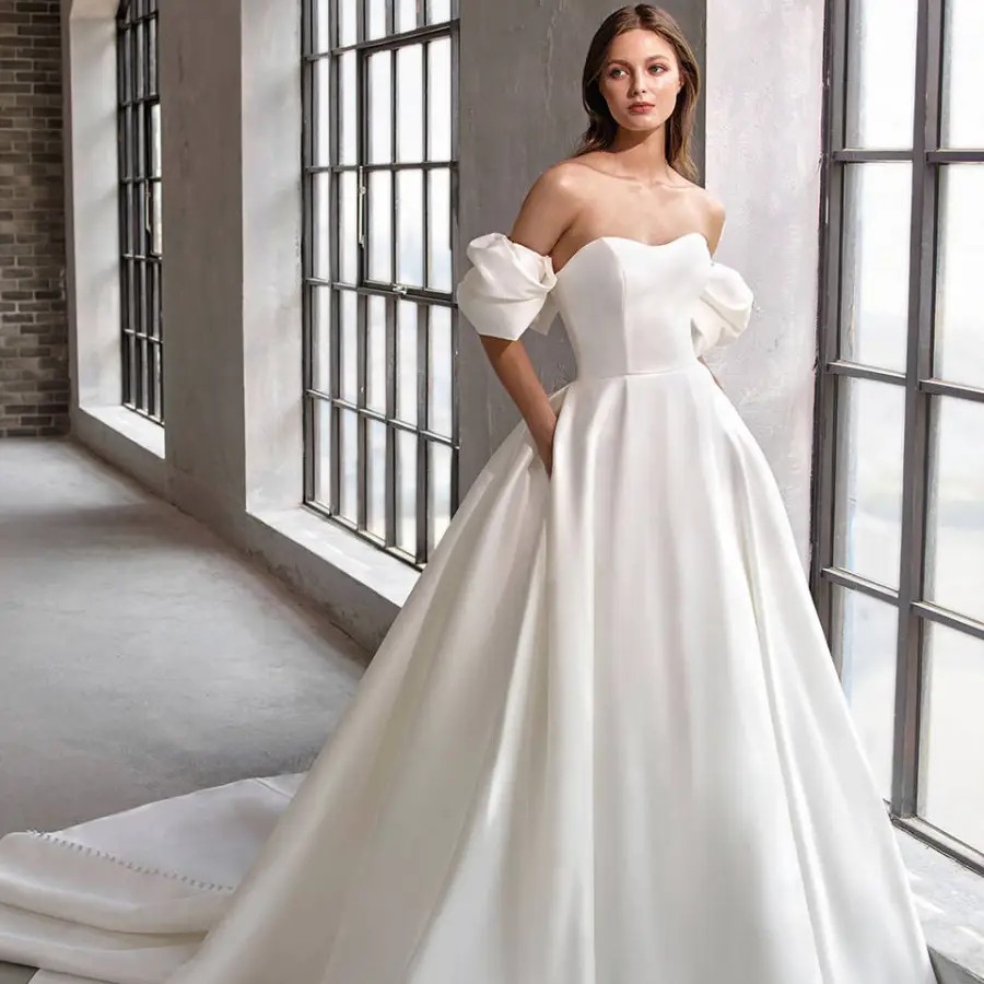 Embrace Your Inner Princess: Wedding Gowns Fit for Royalty Image